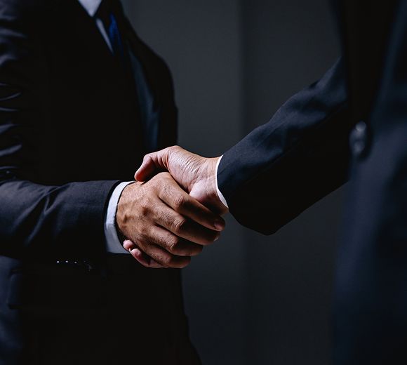 Handshake between two people