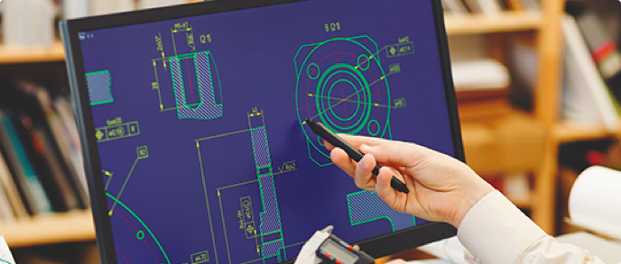 Close-up of a computer monitor displaying a CAD design.